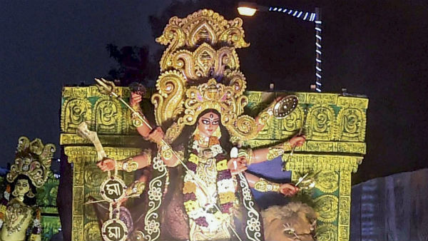 নিয়ম-রীতি মেনে পুজোর আয়োজন 