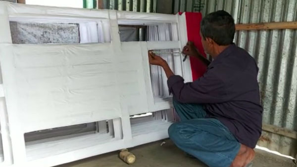 কোচবিহারের ঐতিহ্যবাহী রাসমেলার রাসচক্র! নিরামিষ খেয়ে কাজ এক মুসলিমের