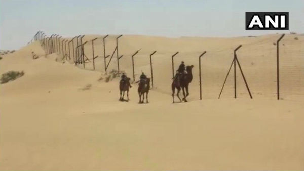 দাবদাহ উপেক্ষা করেও অতন্দ্র প্রহরায় সেনা দাবদাহ উপেক্ষা করেও অতন্দ্র প্রহরায় সেনা