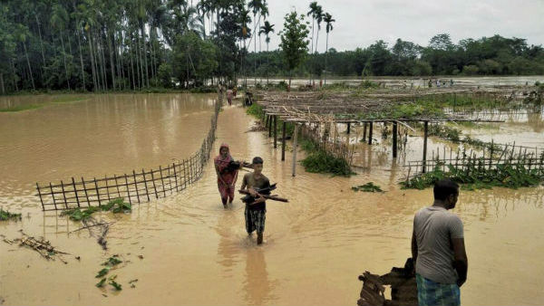 দু’‌বার বন্যা অসমে