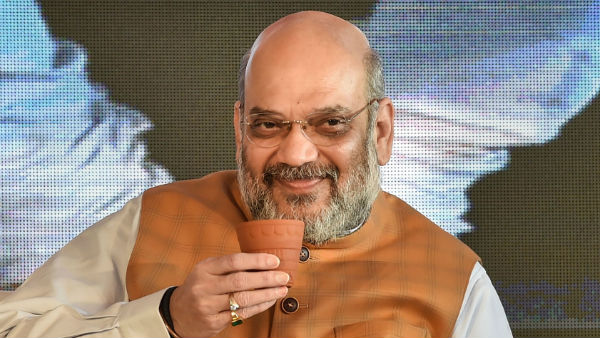  অজয় চক্রবর্তীর বাড়িতে অমিত শাহ