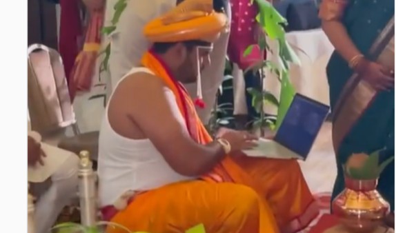 বরের কোলে ল্যাপটপ