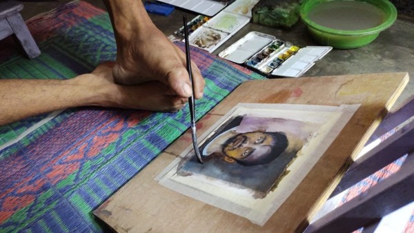 পা-ই প্রতিবাদের হাতিয়ার, ছবি এঁকে অভিনব প্রতিবাদ শিল্পীর 
