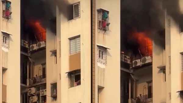 বহুতলের একটি ঘরে এই আগুন লাগে। বহুতলের একটি ঘরে এই আগুন লাগে।