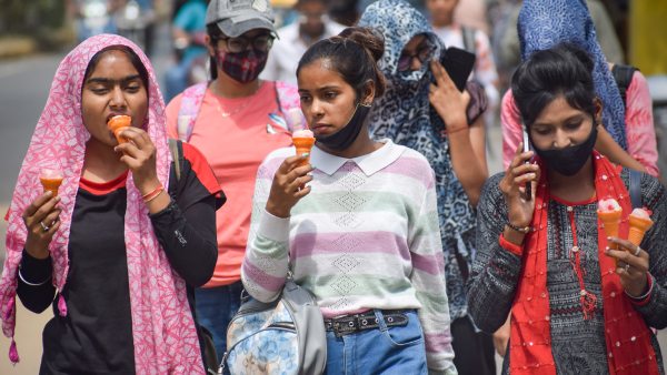 image of three girls eating ice cream image of three girls eating ice cream