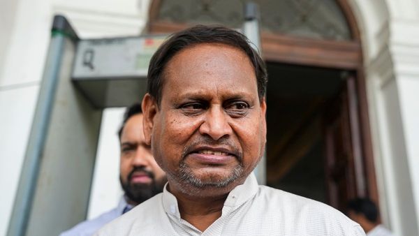 Police team serving legal notice at MLA residence