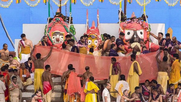 Devotees witnessing the Lord Jagannath Snana Yatra in Puri