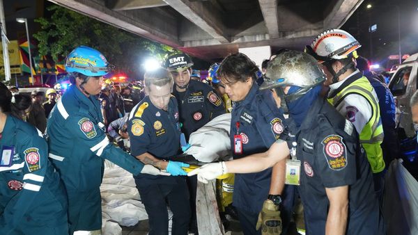 Emergency responders working at the site of Bangkok pub fire Emergency responders working at the site of Bangkok pub fire
