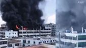28 Killed in China After Shoe Factory Catches Fire; Workers Wave for Help From Rooftop | Watch