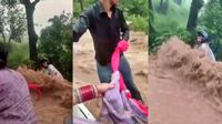 Viral Video: వరదలో చిక్కుకున్న బైకర్.. చున్నీతో ప్రాణాలు కాపాడిన నవ వధువు