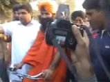 Petrol price hiked: 'Singh' Baba Ramdev rides bicycle