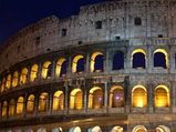 Marines row to cast shadow on the Colosseum in Rome