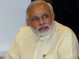 Punish the `mother-son' government, says Modi