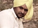 Former AAP member, Punjabi singer Balkar Sidhu joins Congress
