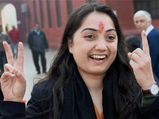 BJP leader seeks to 'save Bengal' using Gujarat riots photo