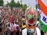 Lok Sabha election: TMC, BJP supporters peacefully share same wall for graffiti writing in Bengal