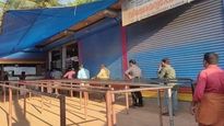 Coronavirus: Social distancing seen outside Kerala liquor shops