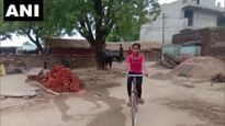 MP: Farmer's daughter scores 98% in 10th, used to cycle 24 km every day to school