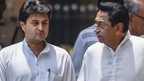 Why are by-polls being held in Madhya Pradesh