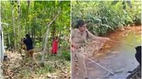 Kerala's Brave Woman Officer Roshini Fearlessly Captures Cobra - Watch The Viral Video