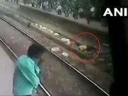 CCTV live records rescue of man who lied down on tracks to commit suicide