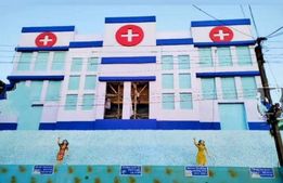 মাস্ক থেকে ভ্যাকসিন, করোনার রোখার 'ঢাল' নিয়ে তৈরি লক্ষ্মী গ্রামের মণ্ডপ 