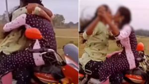 घोर कलयुग आ गया है! चलती बाइक पर एक-दूसरे को KISS करती दिखीं लड़कियां, VIDEO VIRAL 