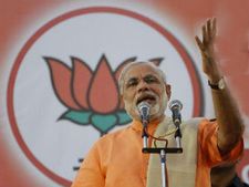 Modi plays down 'repay debt' remark, calls it a media spin