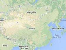 Monk held in China for carrying Dalai Lama's portrait