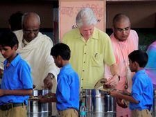School kids gift baby costumes to would be grandpa Clinton