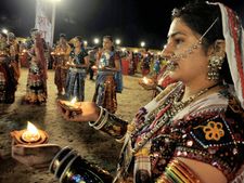 Godhra Muslims earn living by crafting 'dandiyas' for Navratri