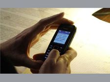 Speaker warns members against use of mobile inside House