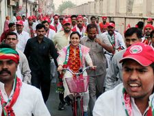 Mulayam's daughter-in-law campaigns on cycle in UP