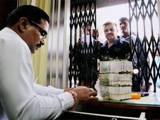 Narendra Modi urged against forcing people to use credit, debit cards