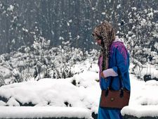In Pics: Snow blankets Srinagar, normal life affected