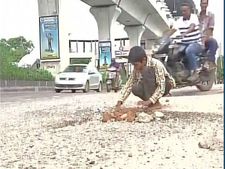 Hyderabad boy shows way, fills potholes to save lives