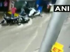 Hyderabad: After sudden downpour, bikes seen floating on flooded street