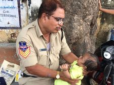Hyderabad: Cop lulls baby to sleep as mother takes examination