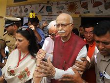 'Unwell' L K Advani casts vote in Ahmedabad, says,'he never missed voting since 1952'