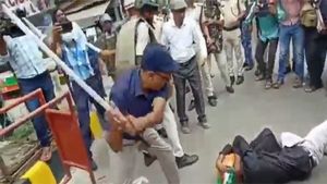 Caught on camera: Bihar bureaucrat thrashes protesting job aspirant holding national flag