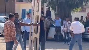 Viral video: Cops beat up suspects by holding them against electric pole