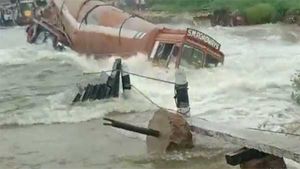 Viral video: When a tanker got swept away by an overflowing stream! 