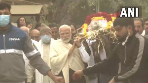 Teary-eyed PM Modi carries mortal remains of his late mother Heeraben | Watch