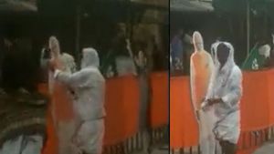 Karnataka man wipes off rainwater from PM Modi's cutout, wins hearts