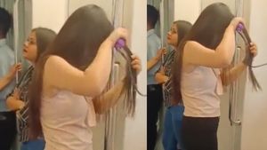 Video Of Girl Straightening Hair Inside Delhi Metro Goes Viral; Netizens Fume