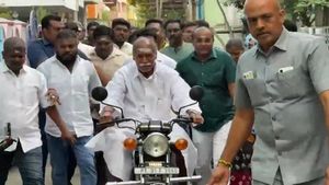 Puducherry Elections: CM N Rangaswamy Rides Bike To Cast Vote, Continues Decades-Old Tradition