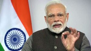 കോഴിക്കോട് മാവൂരിലെ വാഴ കർഷകന്‍ ധർമ്മരാജനുമായി സംവദിച്ച്  പ്രധാനമന്ത്രി നരേന്ദ്ര മോദി