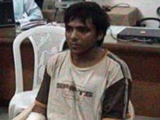 காந்தியடிகளின் சுயசரிதையைப் படிக்கும் கஸாப்