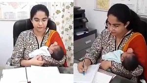 பிறந்த குழந்தையை கையில் ஏந்தியபடி கொரோனா பணிக்கு திரும்பிய ஐஏஎஸ் அதிகாரி - குவியும் பாராட்டு 