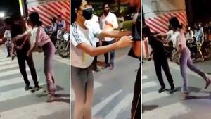 நடு ரோட்டில் போலீஸ்காரர் முன் கார் டிரைவரை எகிறி எகிறி அடித்த பெண்.. வைரலாகும் வீடியோ.. கதறிய இளைஞர் 